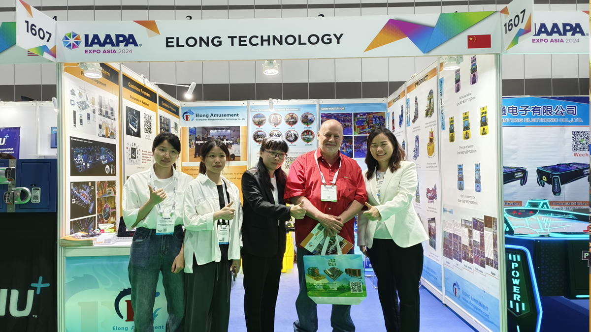 Previous event booth and team photo