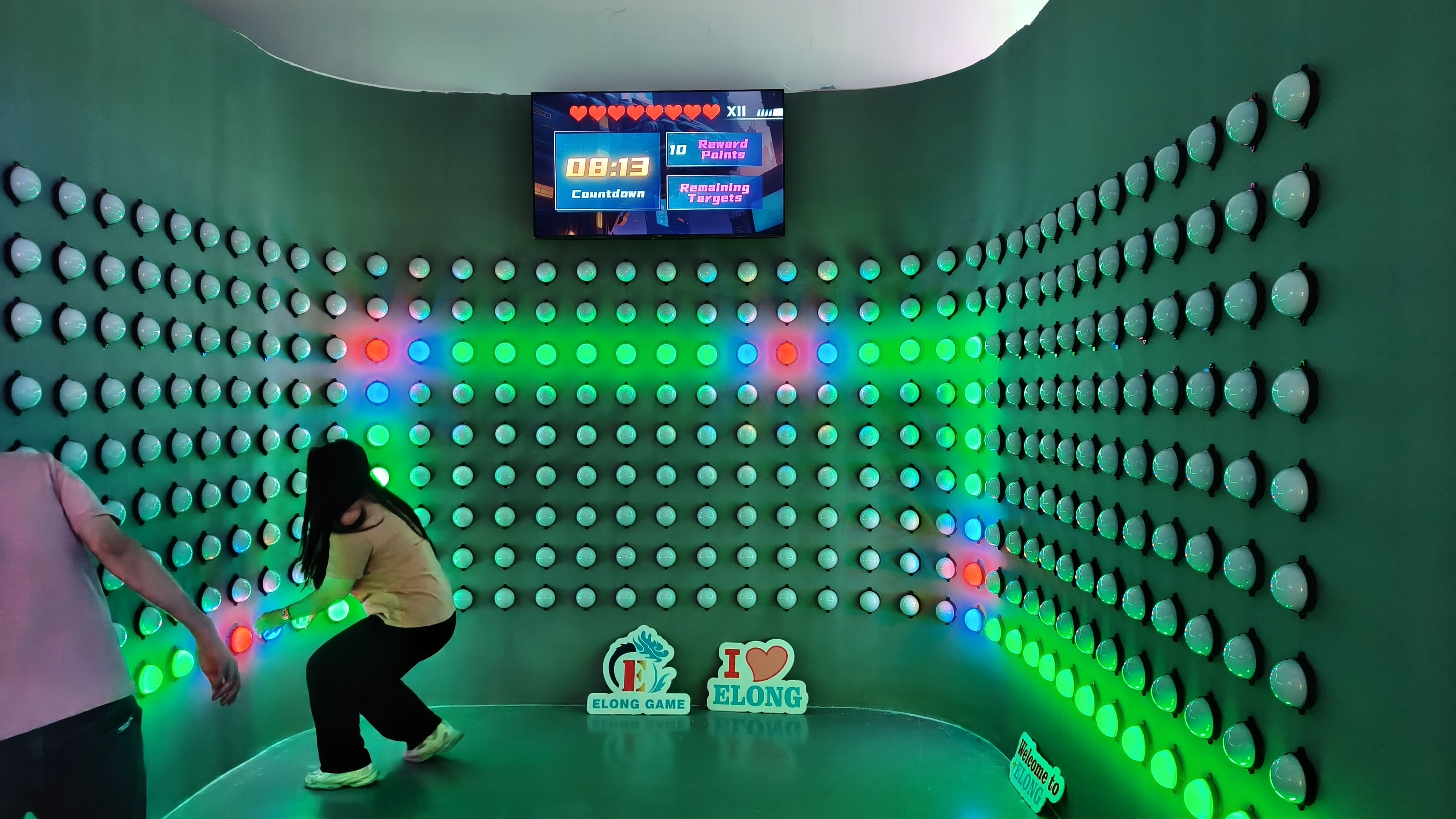 ELONG interactive reaction wall installed in an indoor sports venue